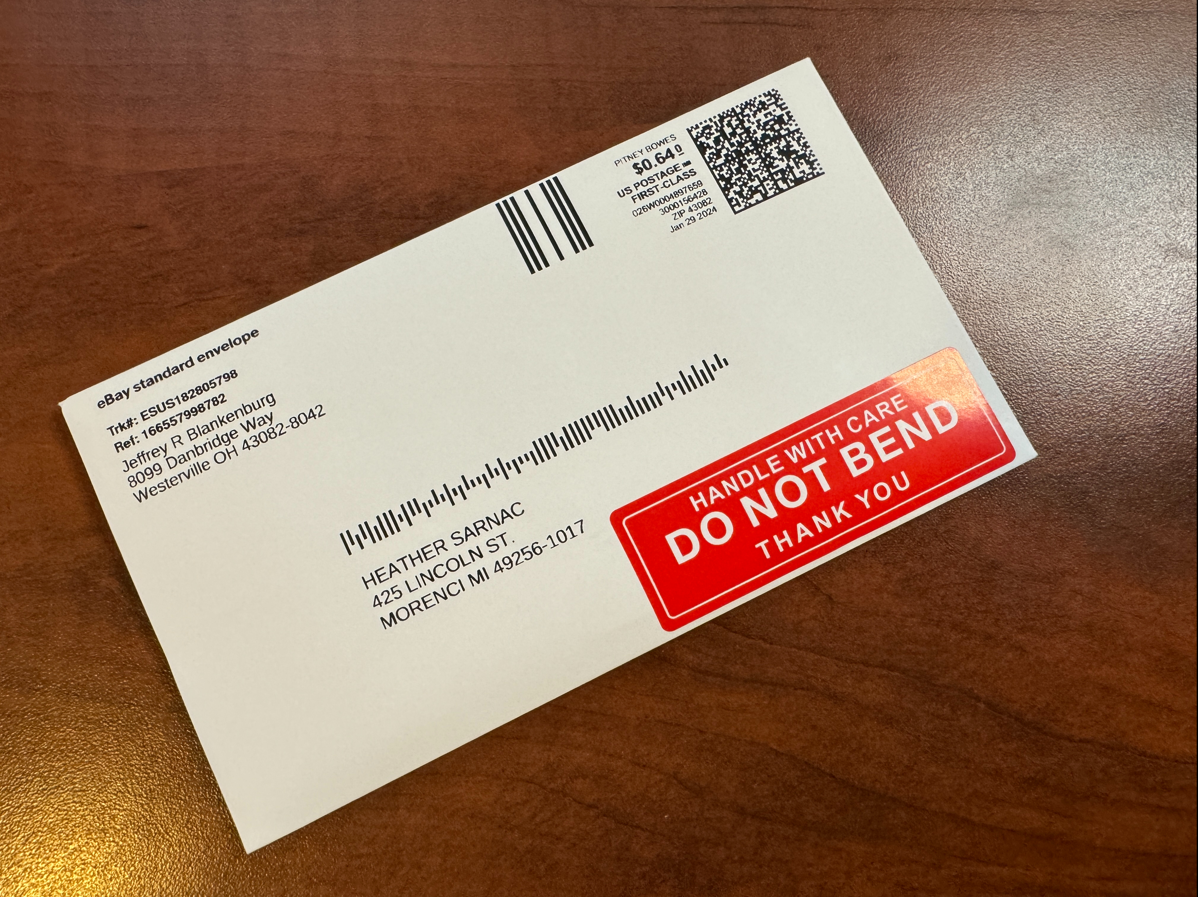 The front of the envelope with a "Do Not Bend" sticker.