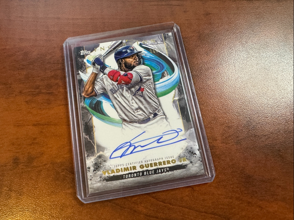 Penny sleeved card in a toploader.